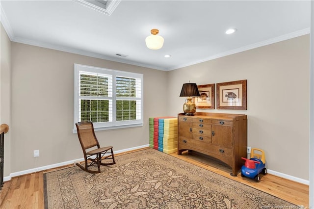 6558 Countryside Dr, Fayetteville, NC 28311 - sitting room featuring wood finished floors, crown molding, baseboards, and recessed lighting