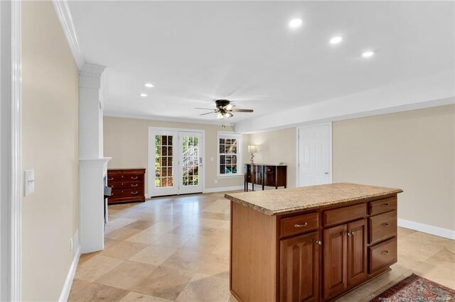 6558 Countryside Dr, Fayetteville, NC 28311 - kitchen with baseboards, ornamental molding, ceiling fan, light countertops, and recessed lighting
