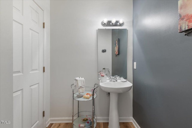 800 Savannah Ridge Rd Unit 109, Holly Springs, NC 27540 - bathroom with wood finished floors and baseboards