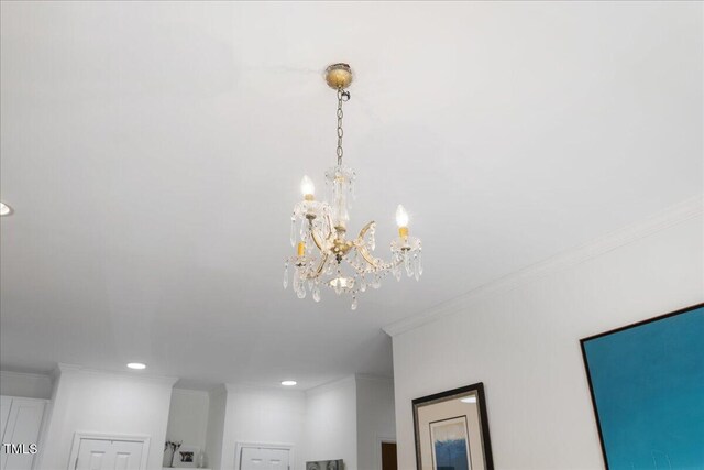 800 Savannah Ridge Rd Unit 109, Holly Springs, NC 27540 - detailed view of a chandelier, ornamental molding, and recessed lighting