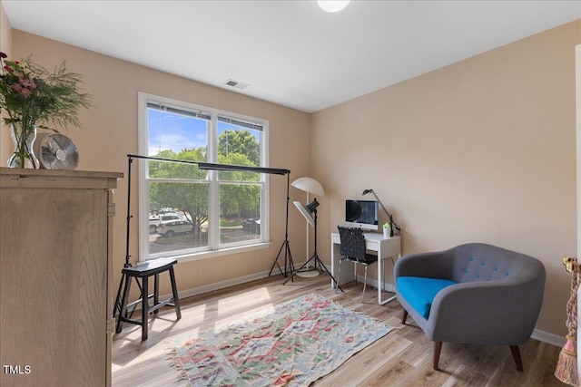 800 Savannah Ridge Rd Unit 109, Holly Springs, NC 27540 - living area featuring wood finished floors and baseboards