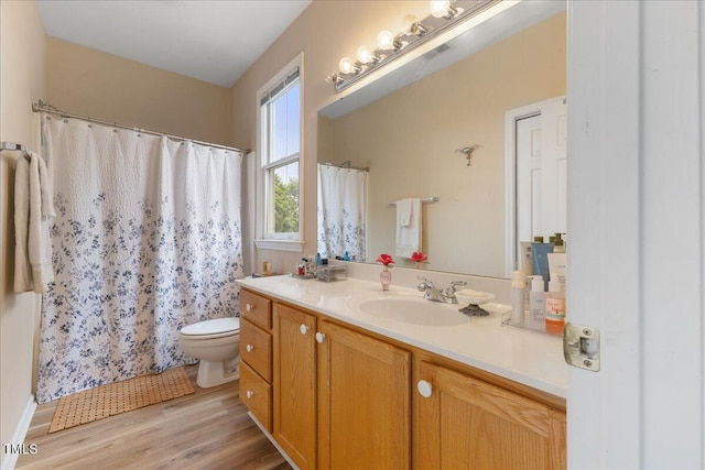 800 Savannah Ridge Rd Unit 109, Holly Springs, NC 27540 - full bath featuring vanity, wood finished floors, and a shower with curtain