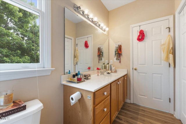 800 Savannah Ridge Rd Unit 109, Holly Springs, NC 27540 - bathroom featuring vanity and wood finished floors