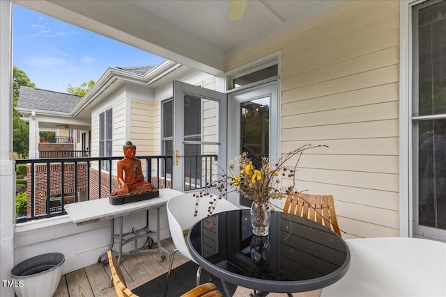 800 Savannah Ridge Rd Unit 109, Holly Springs, NC 27540 - balcony featuring outdoor dining area and ceiling fan