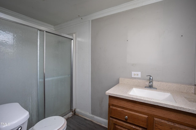 306 W Main St, Pine Level, NC 27568 - full bathroom featuring toilet, vanity, a shower stall, crown molding, and wood finished floors