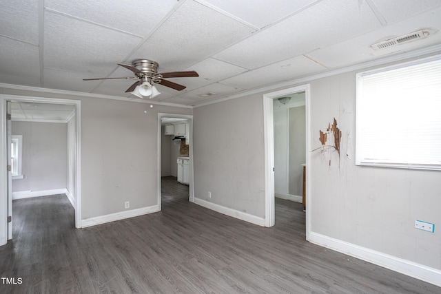 306 W Main St, Pine Level, NC 27568 - empty room featuring a ceiling fan, wood finished floors, baseboards, and attic access