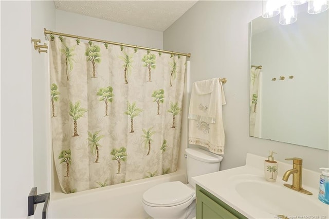 104 Blue Jay Ct, Fayetteville, NC 28306 - bathroom with vanity, toilet, shower / tub combo with curtain, and a textured ceiling