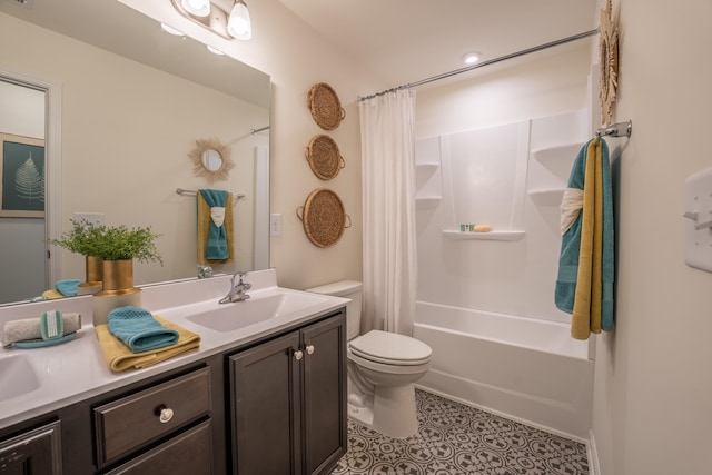 303 Enfield Dr, Carthage, NC 28327 - bathroom with double vanity, toilet, shower / tub combo, and tile patterned floors