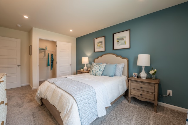 303 Enfield Dr, Carthage, NC 28327 - carpeted bedroom featuring recessed lighting, baseboards, a closet, and a walk in closet