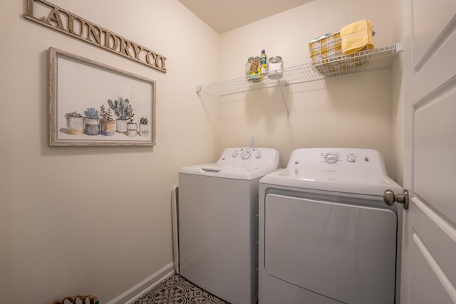 303 Enfield Dr, Carthage, NC 28327 - laundry room featuring washing machine and clothes dryer and baseboards