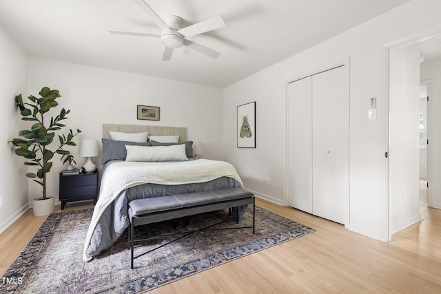 939 Clarion Dr, Durham, NC 27705 - bedroom with light wood finished floors, a closet, and a ceiling fan