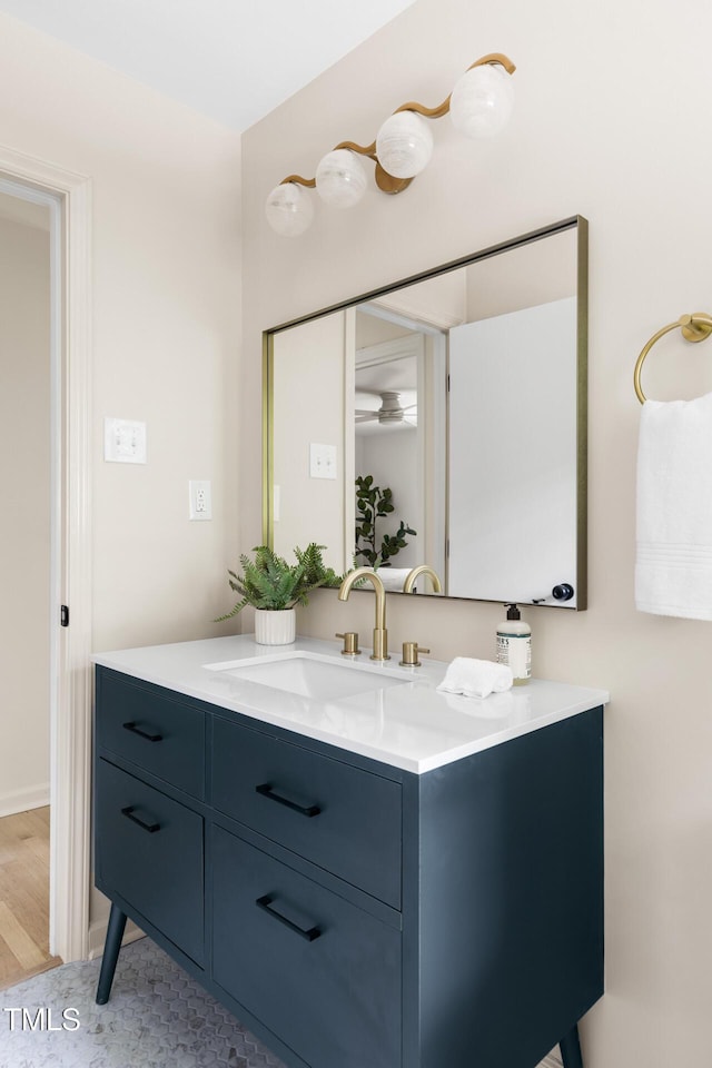 939 Clarion Dr, Durham, NC 27705 - bathroom featuring vanity and wood finished floors