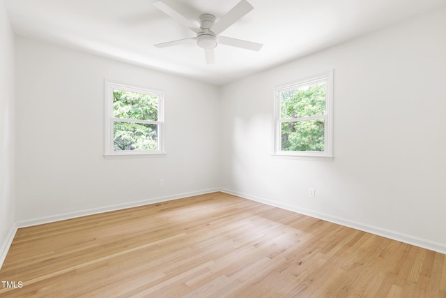 939 Clarion Dr, Durham, NC 27705 - spare room with healthy amount of natural light, light wood-type flooring, and ceiling fan