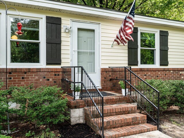 203 Lane Of Sir Kay, Garner, NC 27529 - view of exterior entry with brick siding