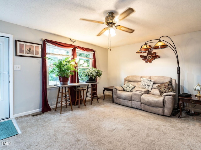 203 Lane Of Sir Kay, Garner, NC 27529 - living area featuring carpet floors, a ceiling fan, and a textured ceiling