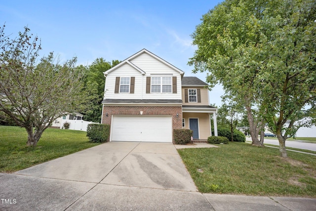 702 Calavaras Ln, Knightdale, NC 27545 - traditional home with an attached garage, driveway, and brick siding
