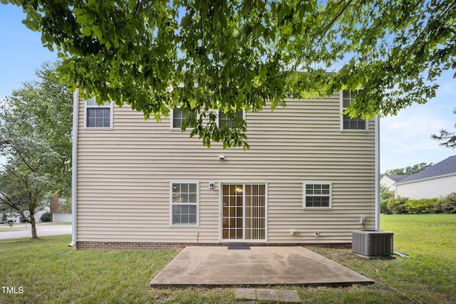 702 Calavaras Ln, Knightdale, NC 27545 - rear view of property with a lawn and a patio
