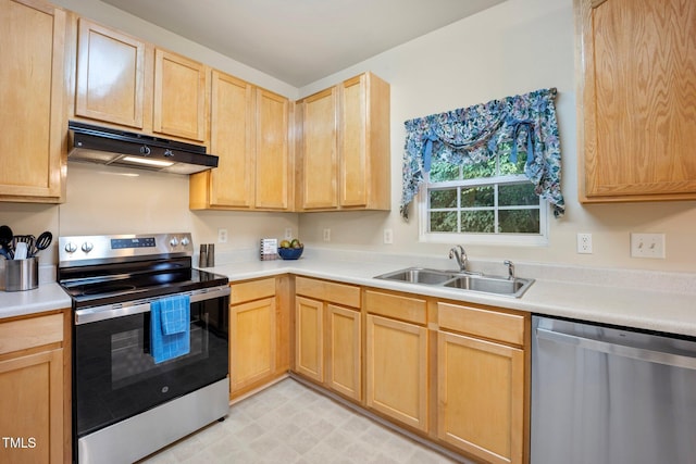 702 Calavaras Ln, Knightdale, NC 27545 - kitchen featuring appliances with stainless steel finishes, under cabinet range hood, light brown cabinets, and light countertops
