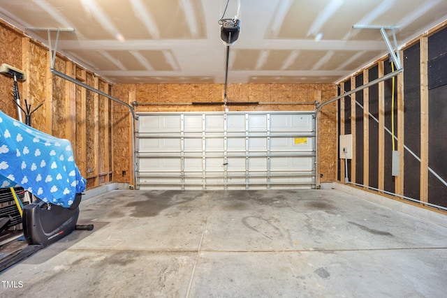702 Calavaras Ln, Knightdale, NC 27545 - garage featuring a garage door opener