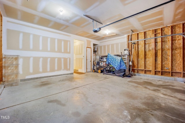 702 Calavaras Ln, Knightdale, NC 27545 - garage featuring a garage door opener