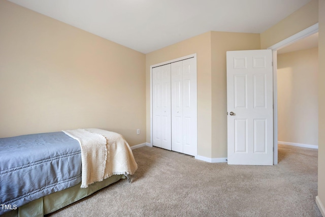 702 Calavaras Ln, Knightdale, NC 27545 - carpeted bedroom featuring baseboards and a closet