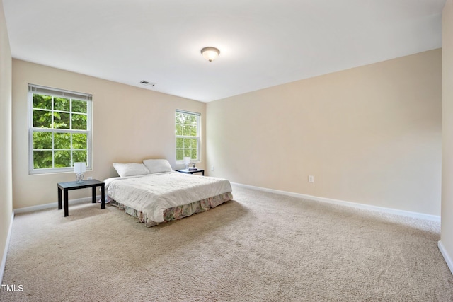 702 Calavaras Ln, Knightdale, NC 27545 - carpeted bedroom with baseboards