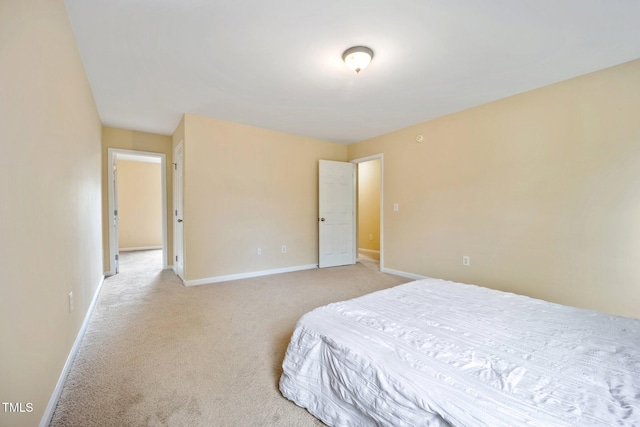 702 Calavaras Ln, Knightdale, NC 27545 - bedroom featuring light carpet and baseboards