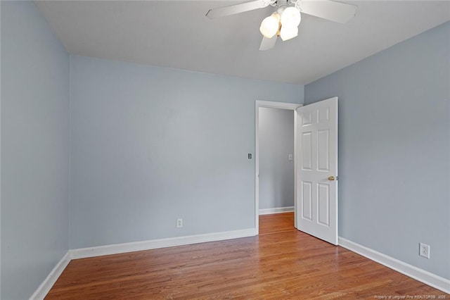 6425 Morganton Rd, Fayetteville, NC 28314 - unfurnished room featuring wood finished floors, baseboards, and ceiling fan