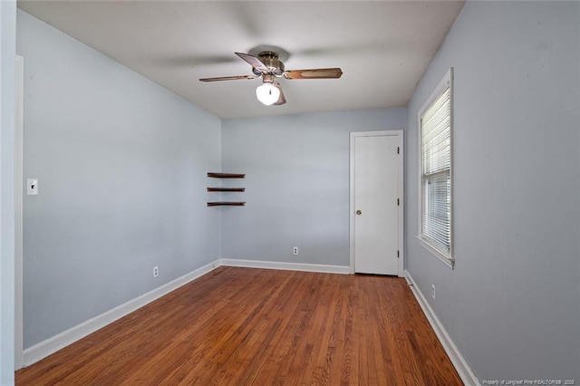 6425 Morganton Rd, Fayetteville, NC 28314 - unfurnished room featuring a ceiling fan, wood finished floors, and baseboards