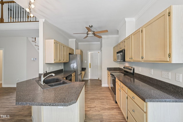 316 Trafalgar Ln, Cary, NC 27513 - kitchen with appliances with stainless steel finishes, a peninsula, dark wood-style flooring, dark countertops, and a ceiling fan