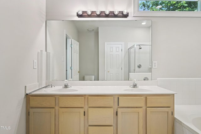 316 Trafalgar Ln, Cary, NC 27513 - bathroom featuring a shower stall, double vanity, and a bath