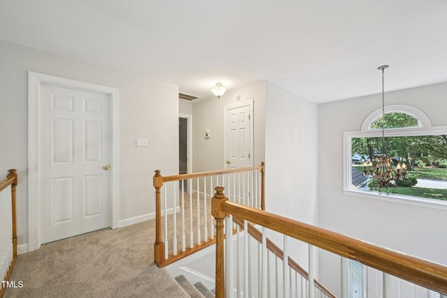 316 Trafalgar Ln, Cary, NC 27513 - corridor with an upstairs landing and light carpet