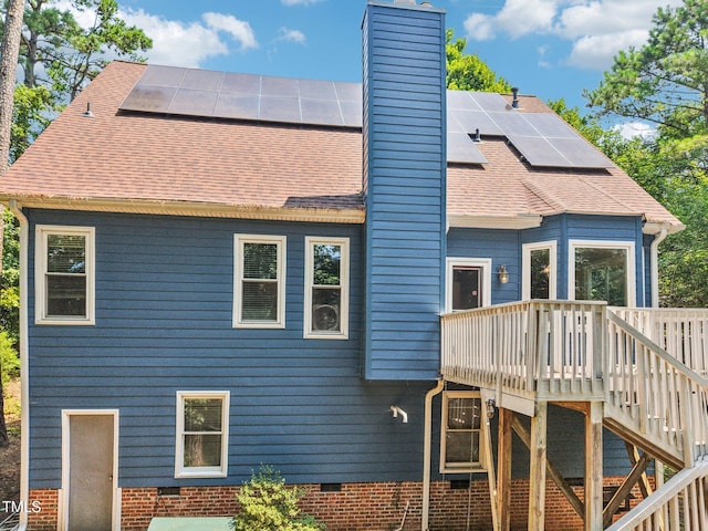 316 Trafalgar Ln, Cary, NC 27513 - back of house with a chimney, crawl space, and solar panels