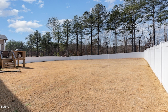 40 Ironwood Blvd, Youngsville, NC 27596 - fenced backyard featuring a wooden deck