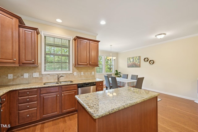 453 Panorama Park Pl, Cary, NC 27519 - kitchen featuring dishwasher, light wood-type flooring, tasteful backsplash, ornamental molding, and light stone counters