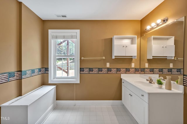 100 Highfield Ave, Cary, NC 27519 - bathroom with vanity and baseboards