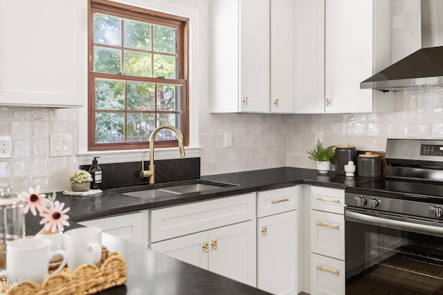 16 Cedar Hill Dr, Durham, NC 27713 - kitchen with electric range, wall chimney range hood, and white cabinets