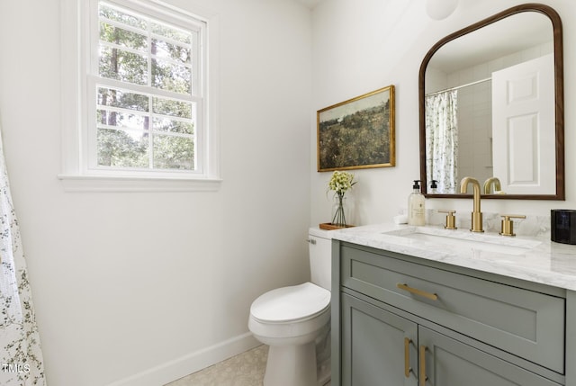 16 Cedar Hill Dr, Durham, NC 27713 - full bath featuring vanity, healthy amount of natural light, tile patterned floors, and curtained shower