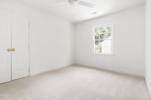 16 Cedar Hill Dr, Durham, NC 27713 - unfurnished bedroom featuring light colored carpet, ceiling fan, and a closet