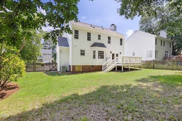 16 Cedar Hill Dr, Durham, NC 27713 - back of house featuring a chimney, a fenced backyard, a shingled roof, crawl space, and a wooden deck