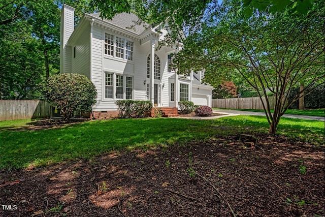 12 Gatesway Ct, Durham, NC 27707 - view of front of home with driveway, a garage, a chimney, and crawl space