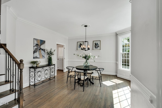 12 Gatesway Ct, Durham, NC 27707 - dining space with ornamental molding, stairs, wood finished floors, and a chandelier
