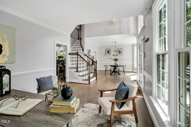12 Gatesway Ct, Durham, NC 27707 - living room with stairway, crown molding, plenty of natural light, and wood finished floors