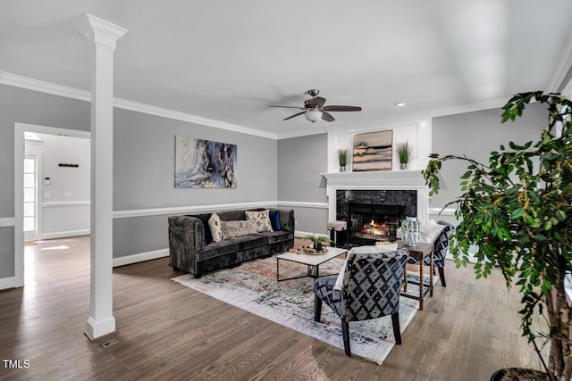 12 Gatesway Ct, Durham, NC 27707 - living room with ceiling fan, crown molding, a fireplace, wood finished floors, and recessed lighting