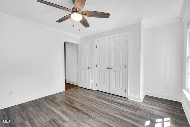 12 Gatesway Ct, Durham, NC 27707 - unfurnished bedroom with wood finished floors, crown molding, a closet, and a ceiling fan