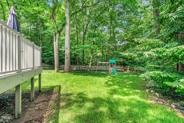 12 Gatesway Ct, Durham, NC 27707 - fenced backyard featuring a playground