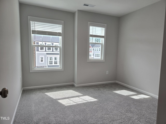 2203 Lambert Rd Unit 67, Cary, NC 27519 - carpeted spare room with baseboards