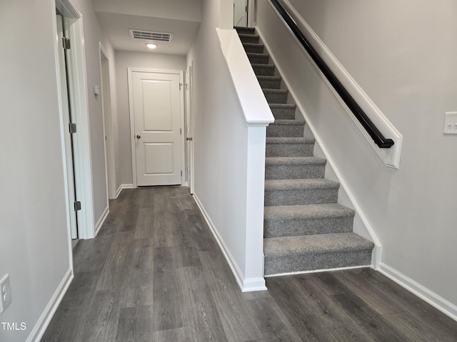 2203 Lambert Rd Unit 67, Cary, NC 27519 - staircase with wood finished floors and baseboards