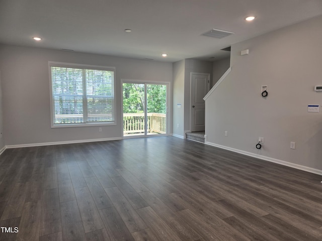 2203 Lambert Rd Unit 67, Cary, NC 27519 - unfurnished living room featuring baseboards, dark wood finished floors, and recessed lighting