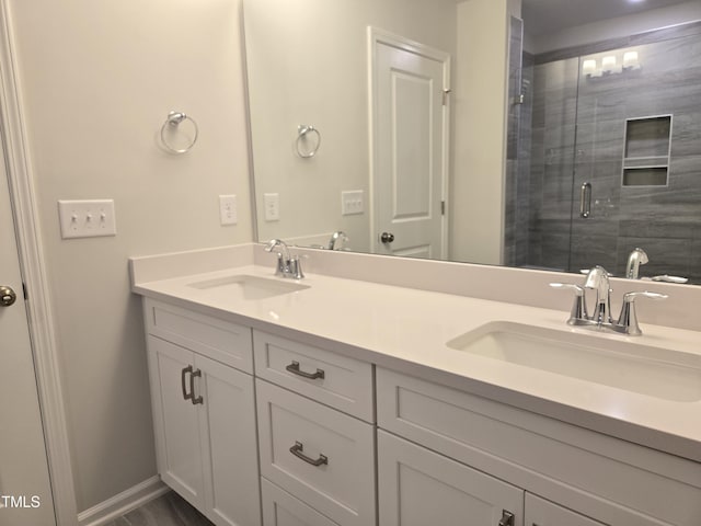 2203 Lambert Rd Unit 67, Cary, NC 27519 - bathroom featuring double vanity and a stall shower